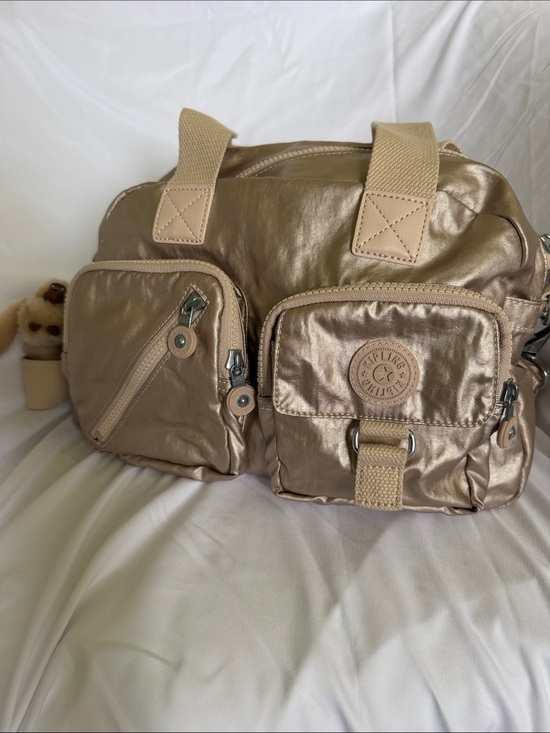 Kipling Handbags - Kipling Metallic Rose Gold Shoulder Bag with Front Pockets
